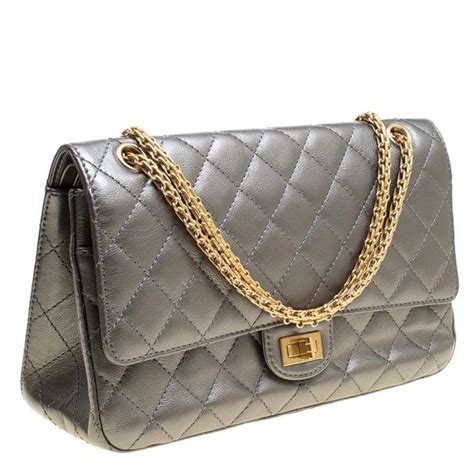 chanel 2.55 grande|Chanel quilted reissue shoulder bag.